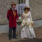 man and woman in costume at Literary Festival