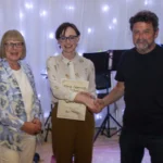 Presentation to Short Story winning author Bernadette Furlong