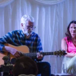 Charlie McGettigan on stage with Andrea Mara