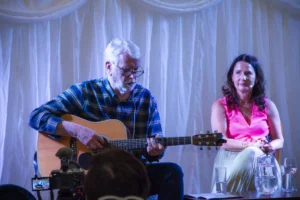 Charlie McGettigan on stage with Andrea Mara
