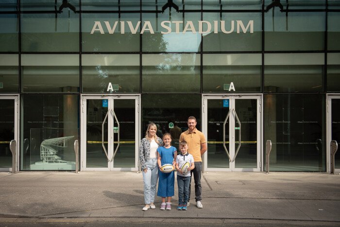 Chelsey Harrington and her family in front of the Aviva Stadium for the Great Aviva Road Trip 2025
