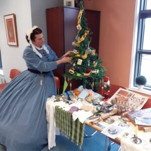 Melissa Shiels is decorating a Victorian Christmas Tree