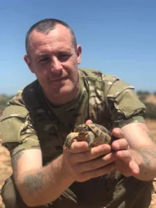 John Dunbar with a turtoise