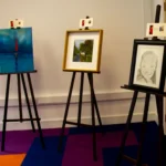 Paintings on easels for an art exhibition