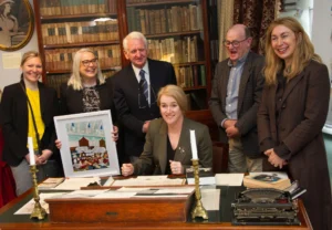 Guests pose for photos at the Maria Edgeworth Centre during the British Ambassador's visit