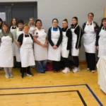 A group of volunteers waiting the help out at the 18th Century Tea Party