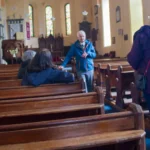 People in St John's Church during the Heritage Town Walk