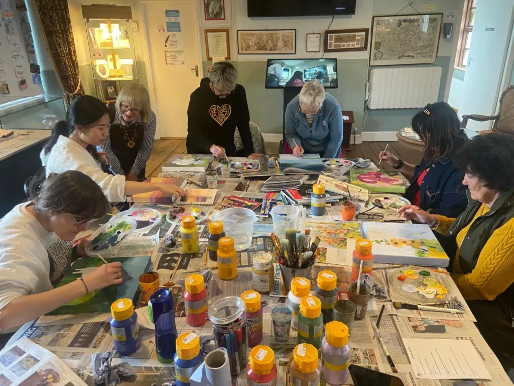 A group of art students practice their painting in the Maria Edgeworth Centre
