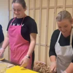 Three ladies preparing the food for the 18th Century Tea Party