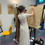 Art student working on her drawing