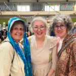 Three ladies in costume at the 18th Century Tea Party