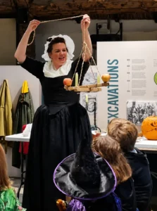 Doctor Melissa Shiels giving a Halloween talk